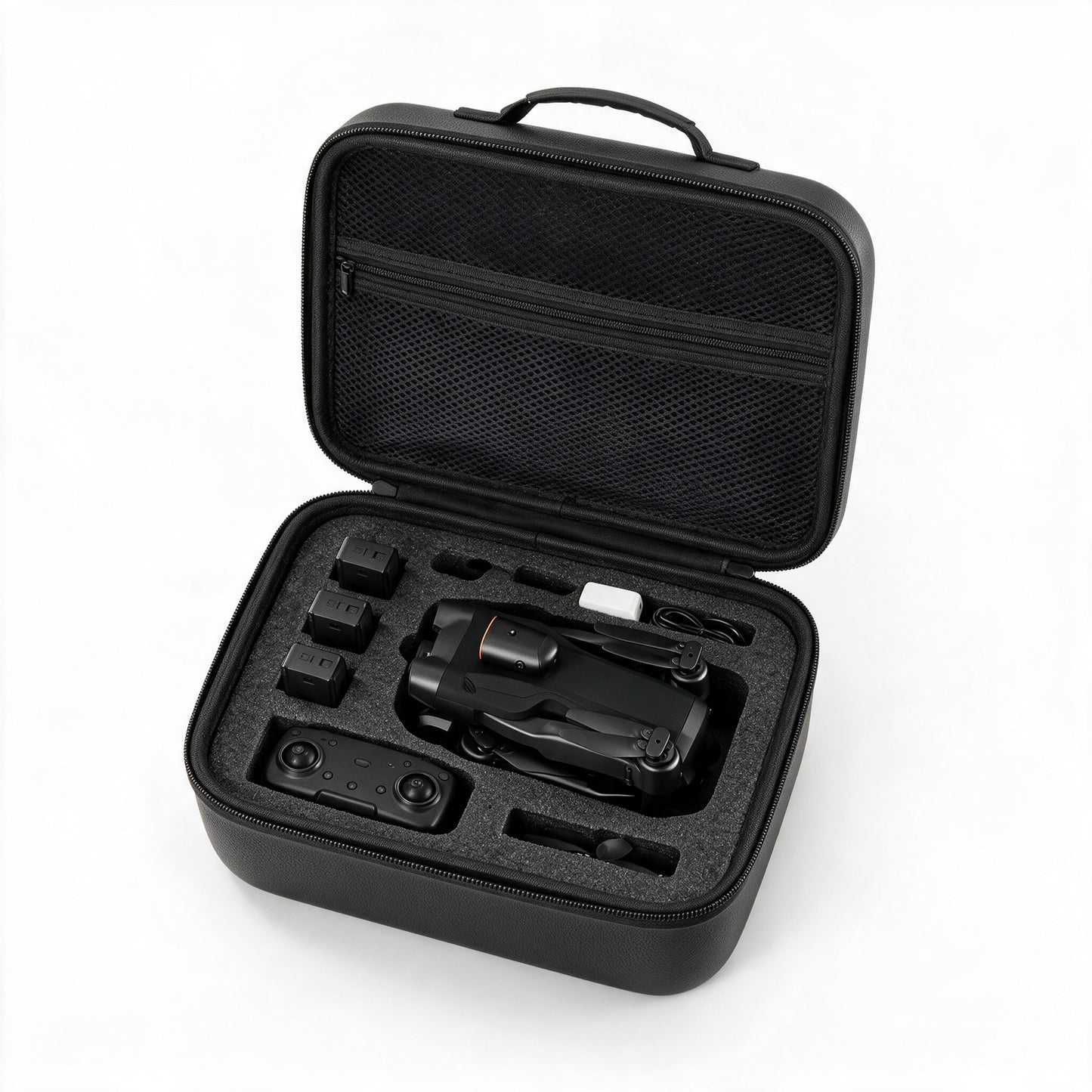Interieur du sac noir : drone NIMBUS plie, radiocommande, batteries et chargeur