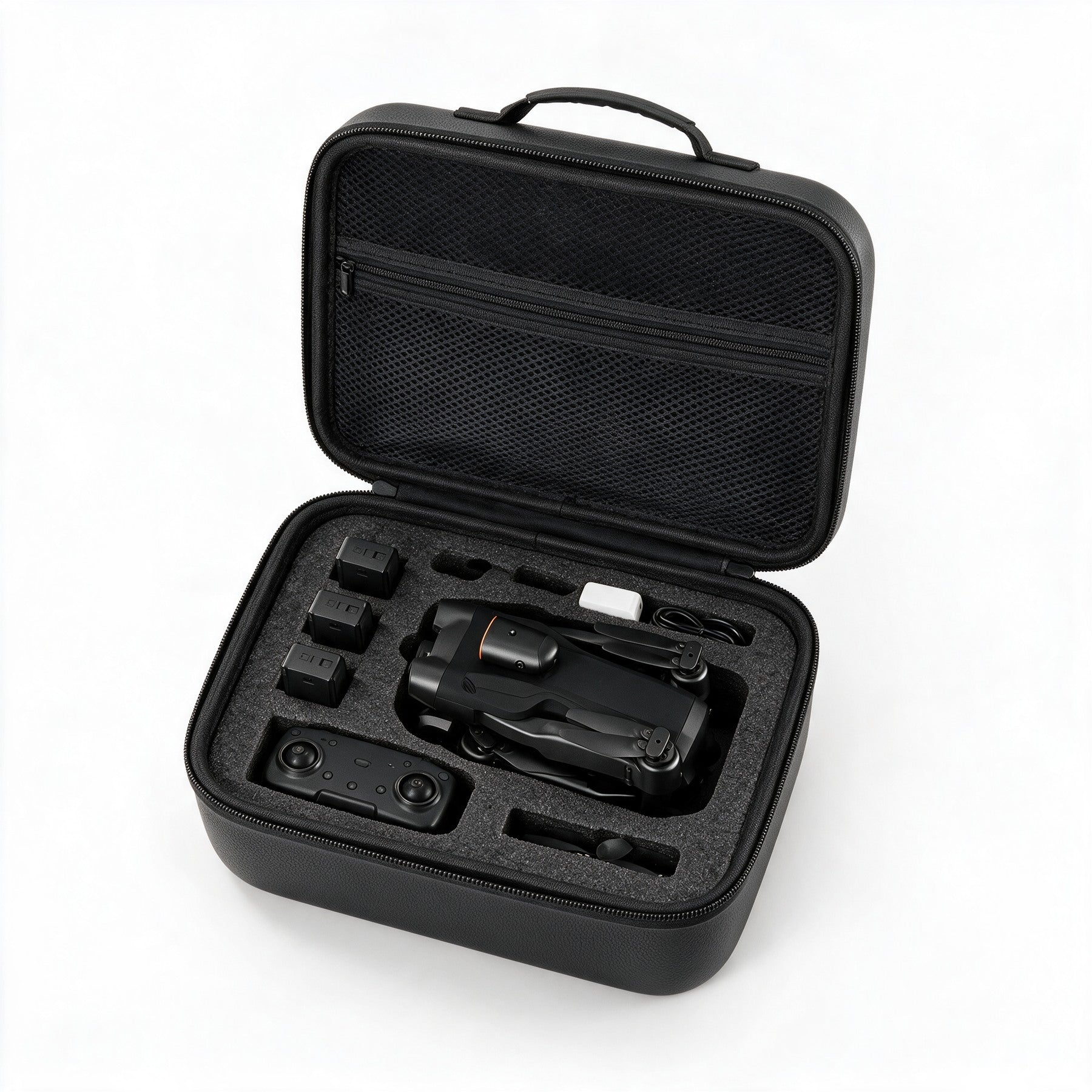 Interieur du sac noir : drone NIMBUS plie, radiocommande, batteries et chargeur